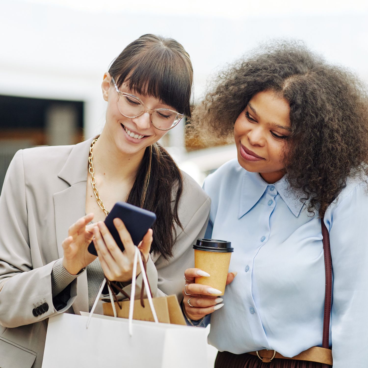 women shopping on phone